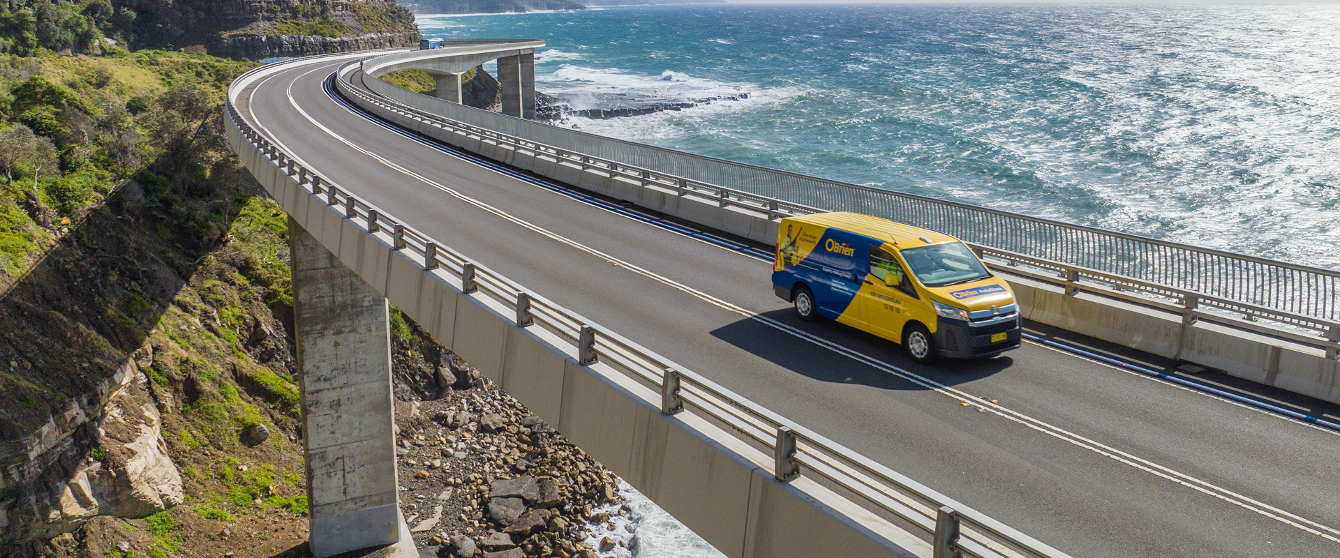 O'Brien service van on a coastal road